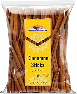 decorate candles with cinnamon sticks