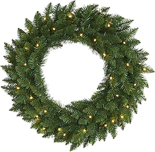 evergreen wreath as base for pom pom wreath 