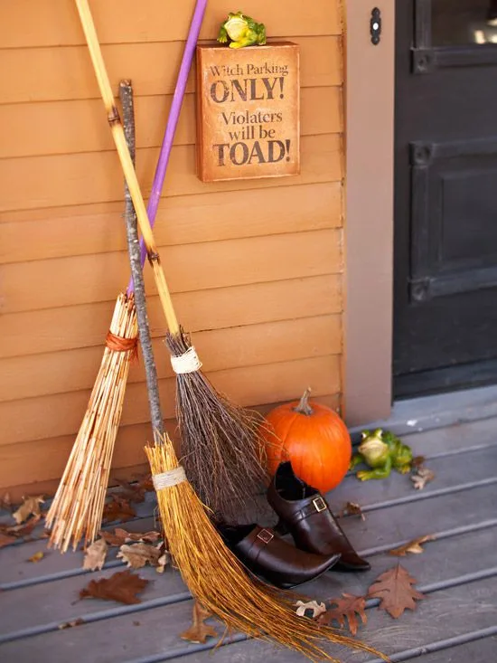 broomstick and witches on porch