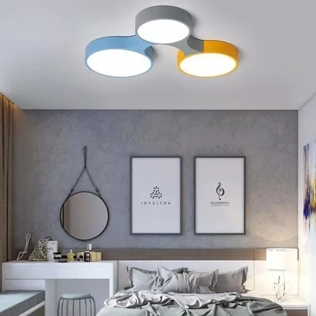 Modular furniture creates zones in a small couple’s bedroom.