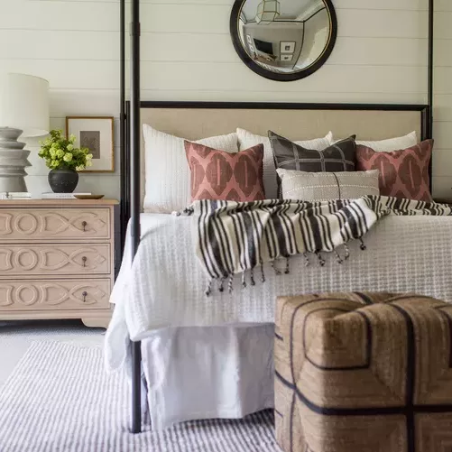 Harmonious blend of styles in a small couple’s bedroom.