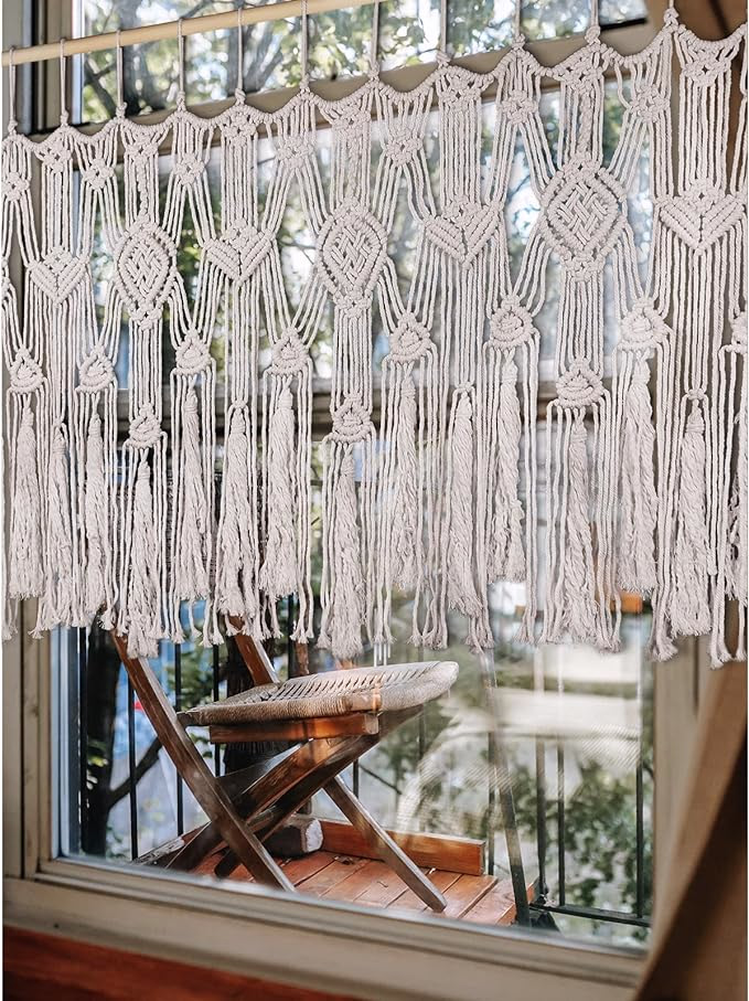 Handmade macrame curtain for bohemian-style decor, available on Amazon.

