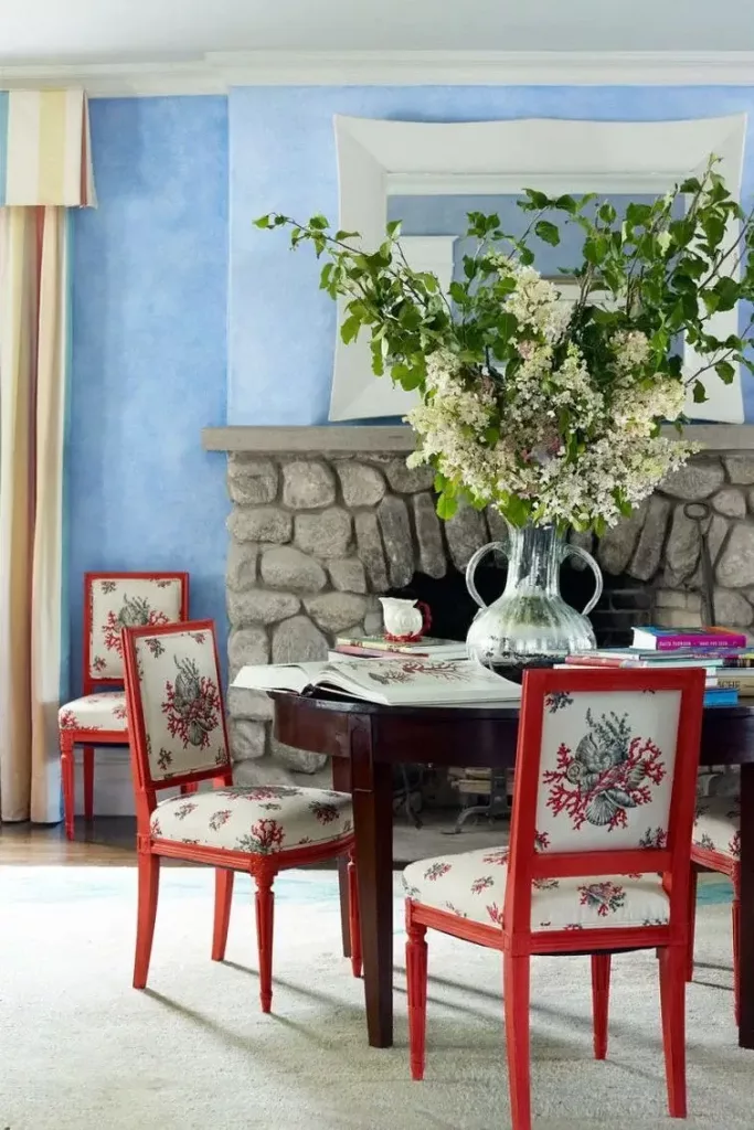living room with stone fireplace