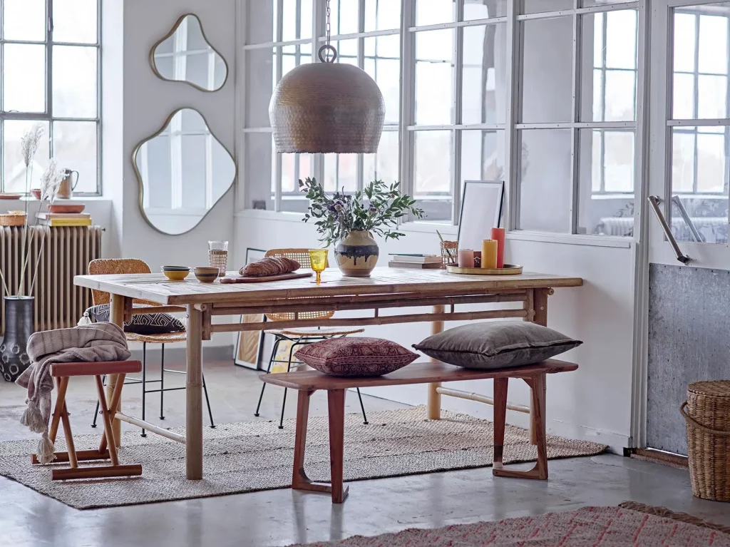 loft style home with cluster mirrors on the wall