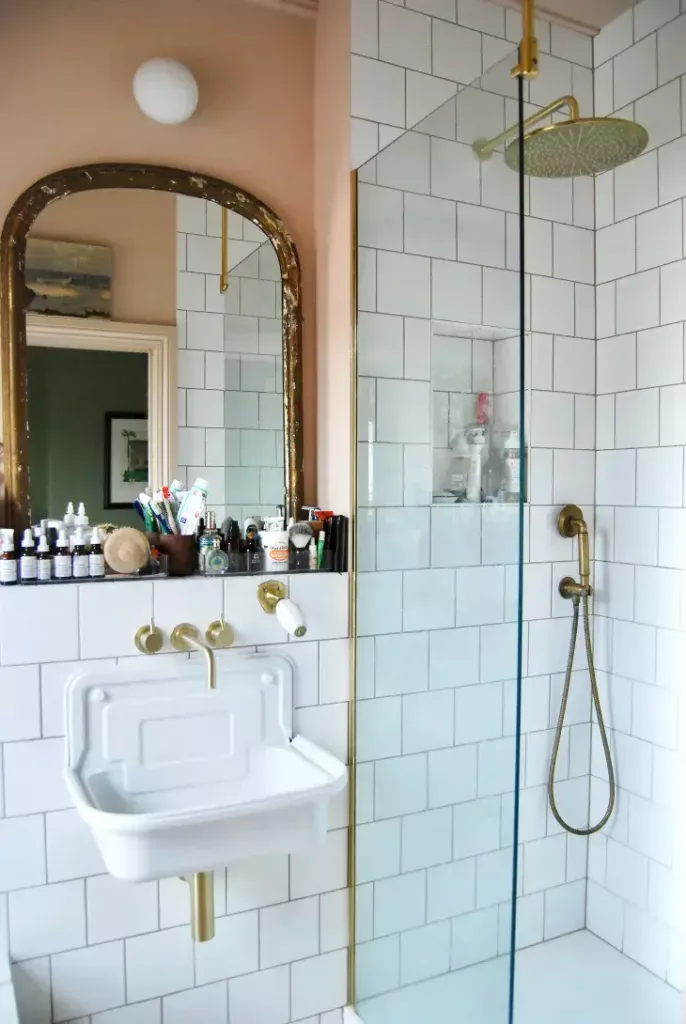 declutter bathroom to fit everything on a small ledge