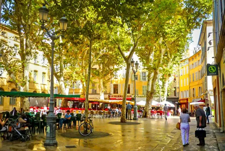 he elegant, tree-lined Cours Mirabeau boulevard in Aix-en-Provence, a perfect base for slow travel in Provence