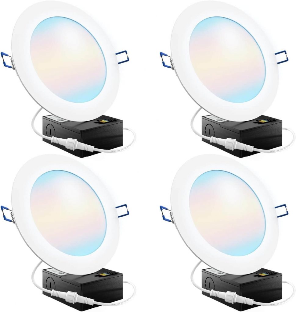 LED ceiling lights brighten a hallway with no natural light and create a warm, modern feel.