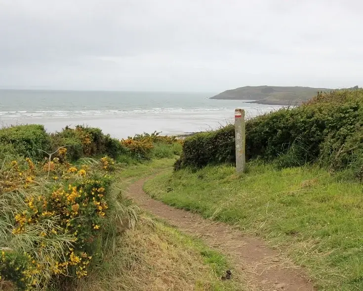 The GR34 coastal path, perfect for slow travel, winding along the wild, rocky coastline of France.