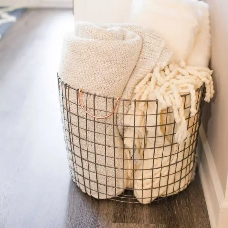 Wire Basket As Living Room Blanket Storage 