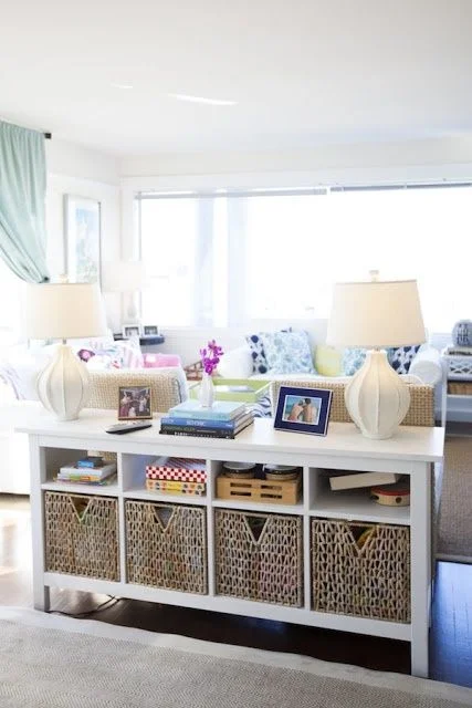 using existing furniture as low story storage, sorting toys for organization