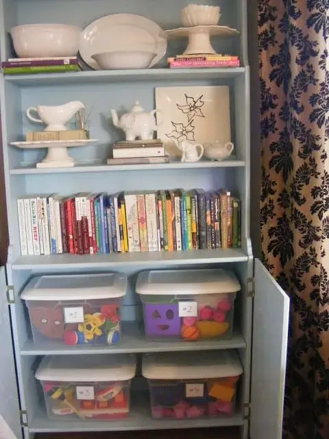 storing toys in a buffet to make use of toy rotation