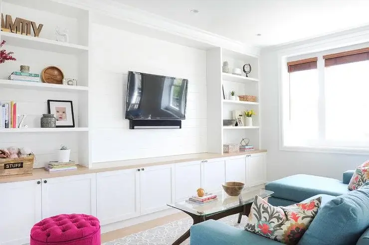 sorting toys in built in cabinets 