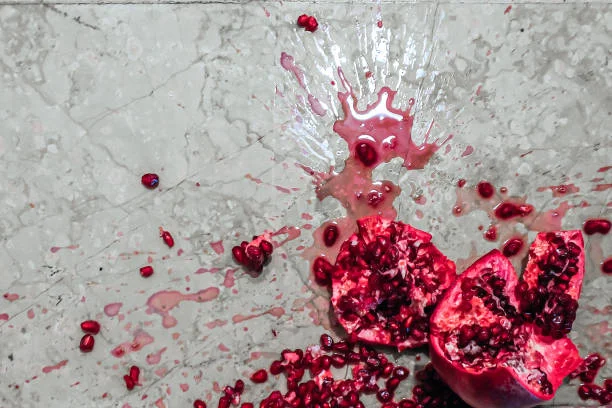 new year traditions around the world pomegranate smashed image from https://greekherald.com.au/culture/why-greek-people-smash-a-pomegranate-every-new-years/