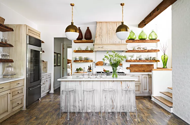 Modern rustic kitchen with industrial lighting and natural wood finishes