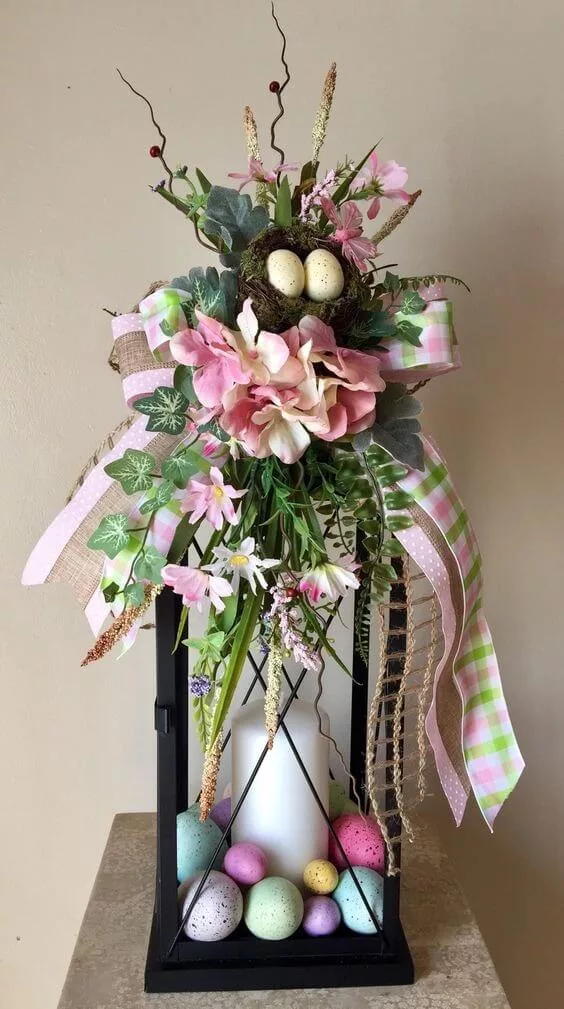 lantern filled with speckled eggs, ribbon, and fresh flowers, offering an elegant and festive touch to Easter home decor