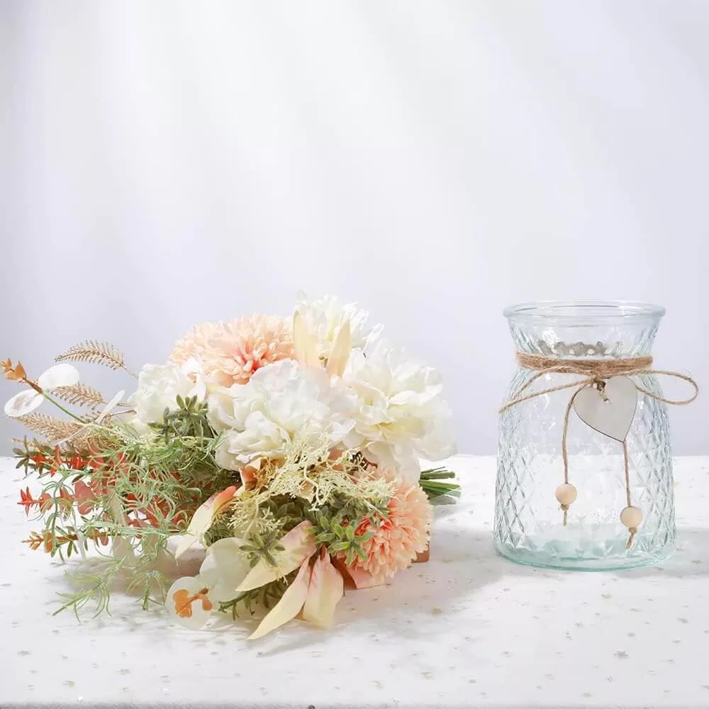 artificial flowers and glass vase