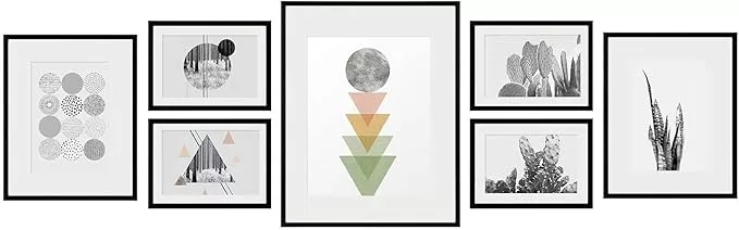 set of artwork in black frames