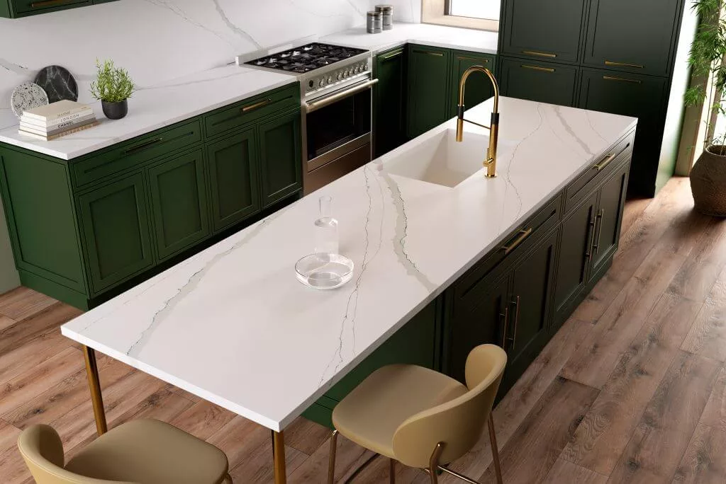 marble counters and green kitchen cabinets