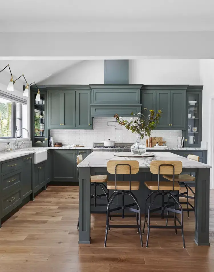 dark green kitchen painted cabinets with white accents