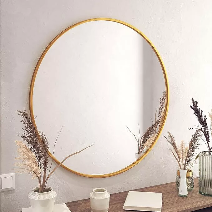 round large mirror with gold frame