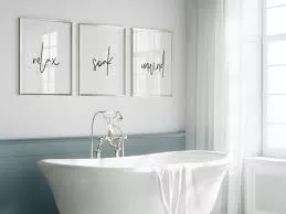 famed word as wall art in a bathroom