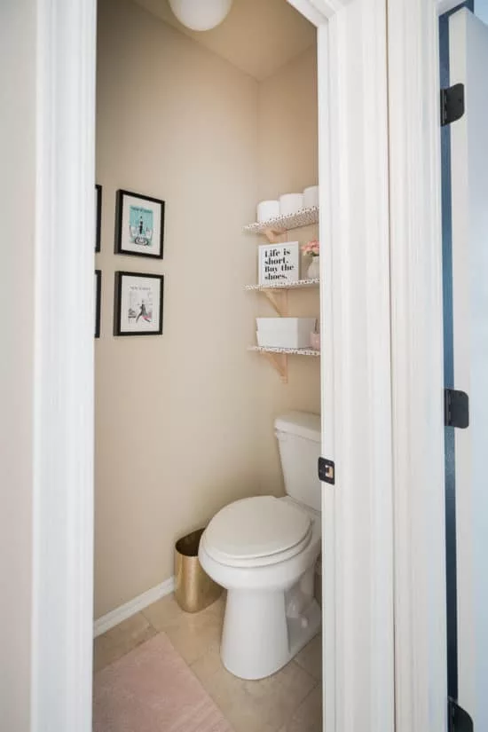 simple shelves in toilet room as decor and storage.