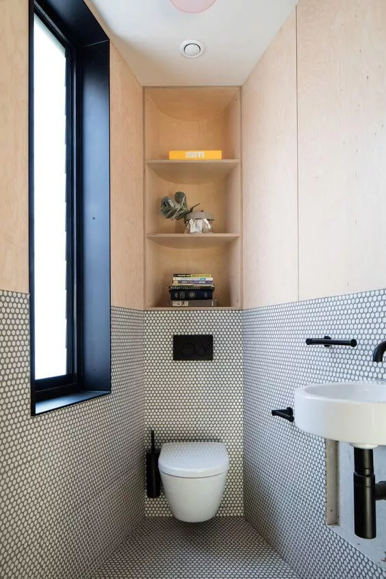 built in shelves in a small toilet room