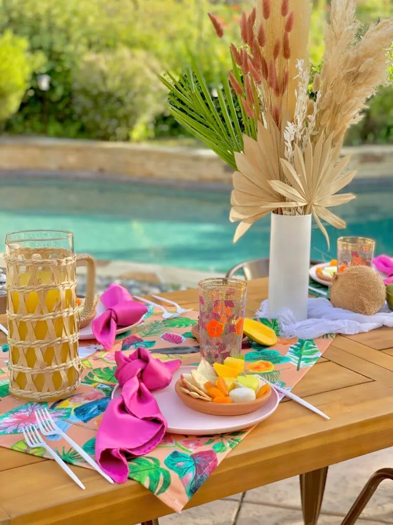 luau themed summer tablescape for outdoor dining