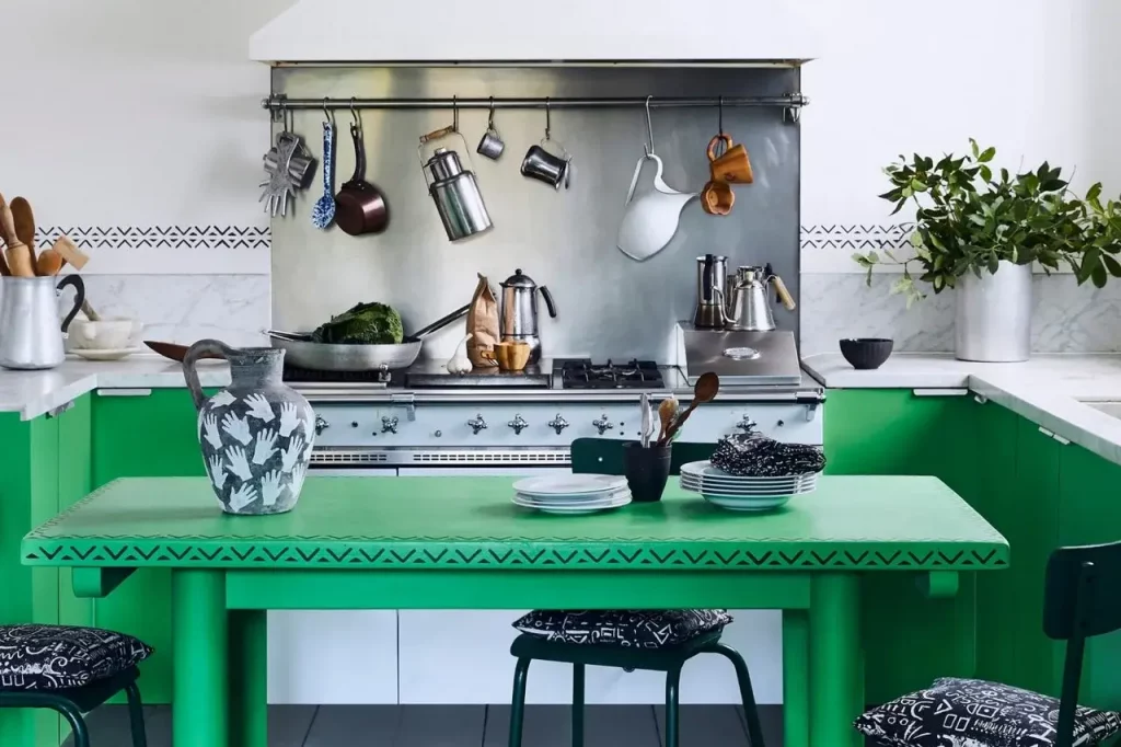 green kitchen cabinets and table
