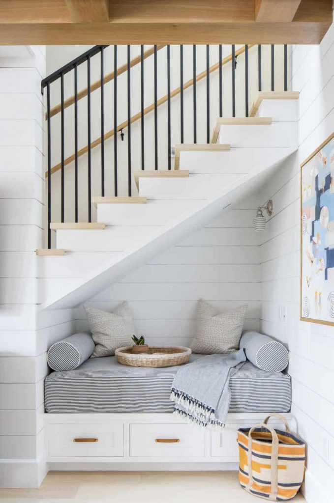 comfortable seating under the stairs