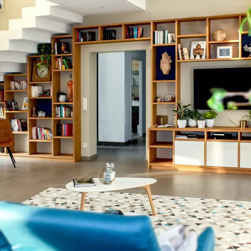 under the stair storage and bookshelves and tv stand.