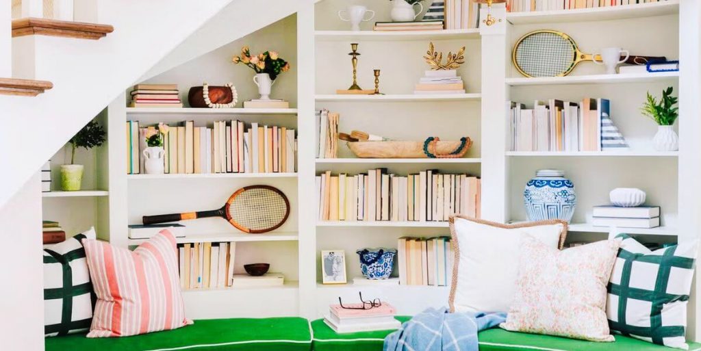 mini library under the stairs