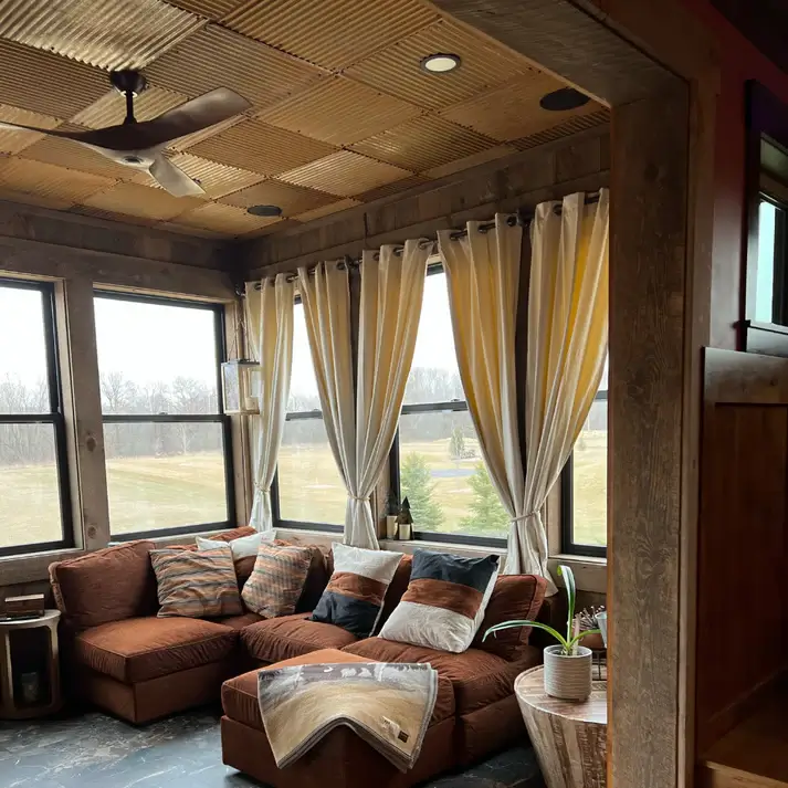 Warm rust and ton ceiling colors adding rustic vibes