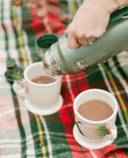 thermos of hot chocolate as a cozy welcome drink