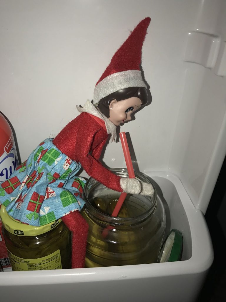 elf on the shelf in the fridge