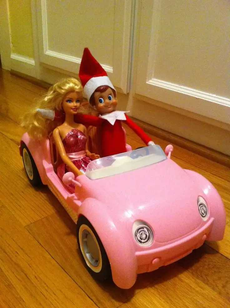 elf on the shelf in a barbie car