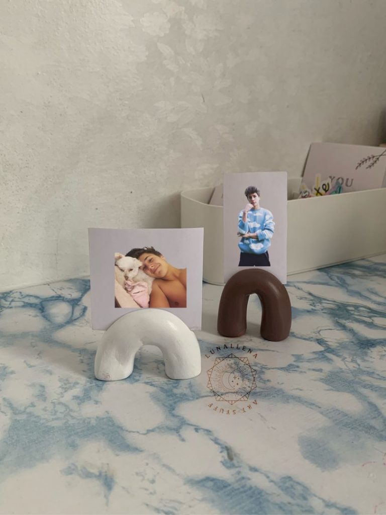 A minimalist air dry clay Polaroid holder, a modern DIY Mother's Day gift.