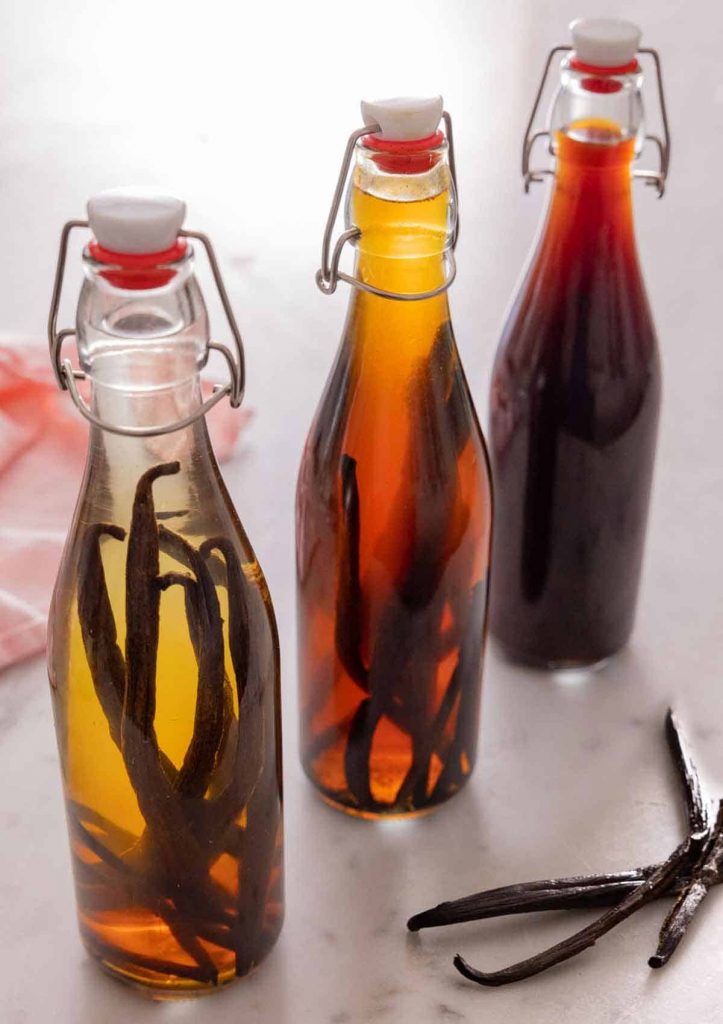 Bottled homemade vanilla extract, an impressive and eco-friendly homemade Christmas gift.