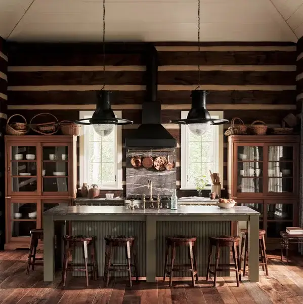 A cohesive kitchen collection of baskets creates a unified look above the cabinets.