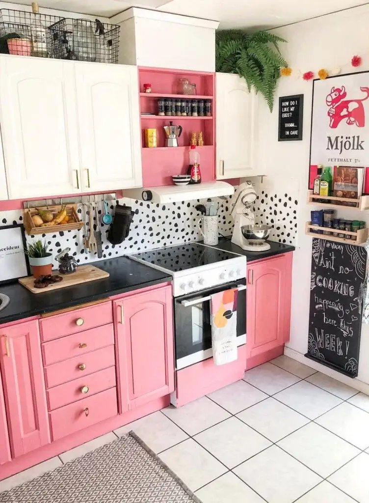 wire baskets and a fern demonstrate how to decorate on top of cabinets with texture.