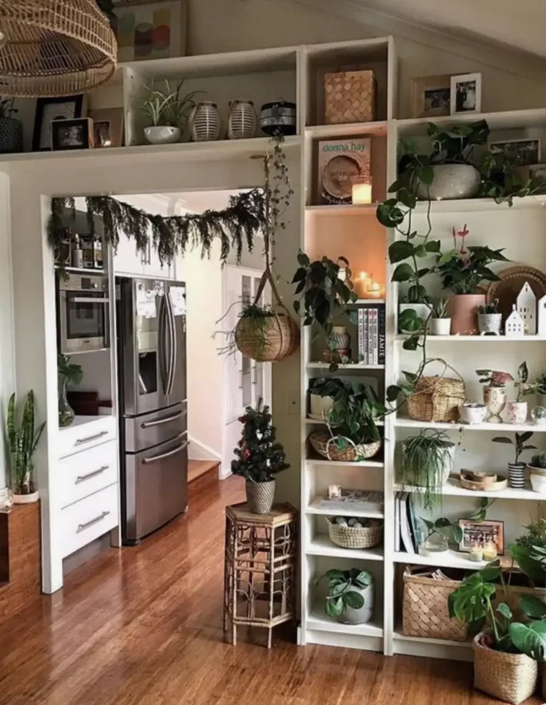 floor to ceiling bookshelves in  a living room with plants and decor