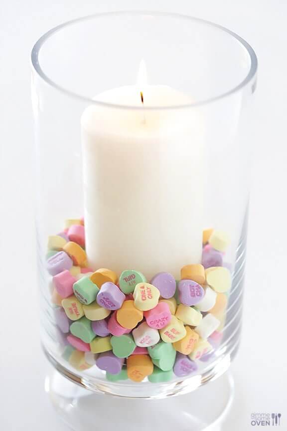 Candy heart candles as cute Valentine’s table decorations