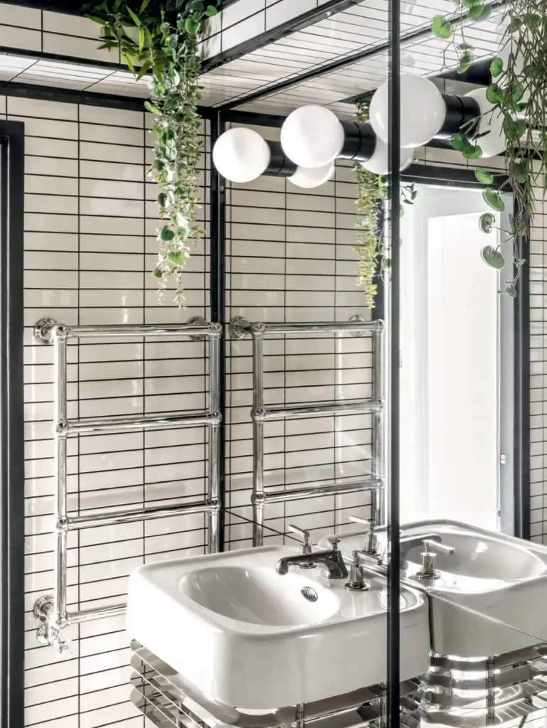 ivy in a monochromatic bathroom