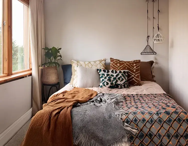 small bedroom layout in tiny room with only a bed