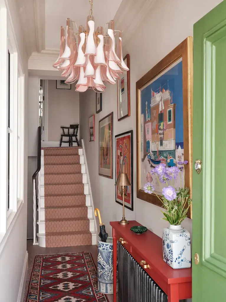 small home entrance design with bold patterns and color palette
