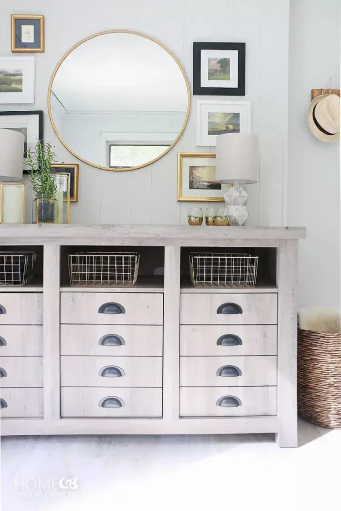 entryway mirror above console table in bright entryway