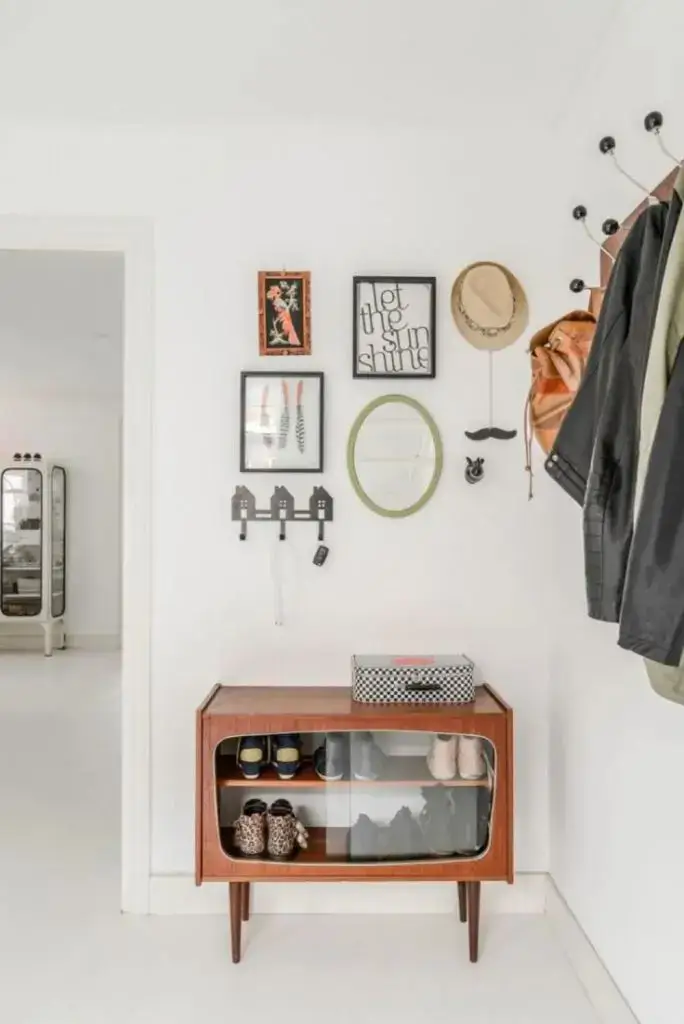 small home entryway vertical storage and decor