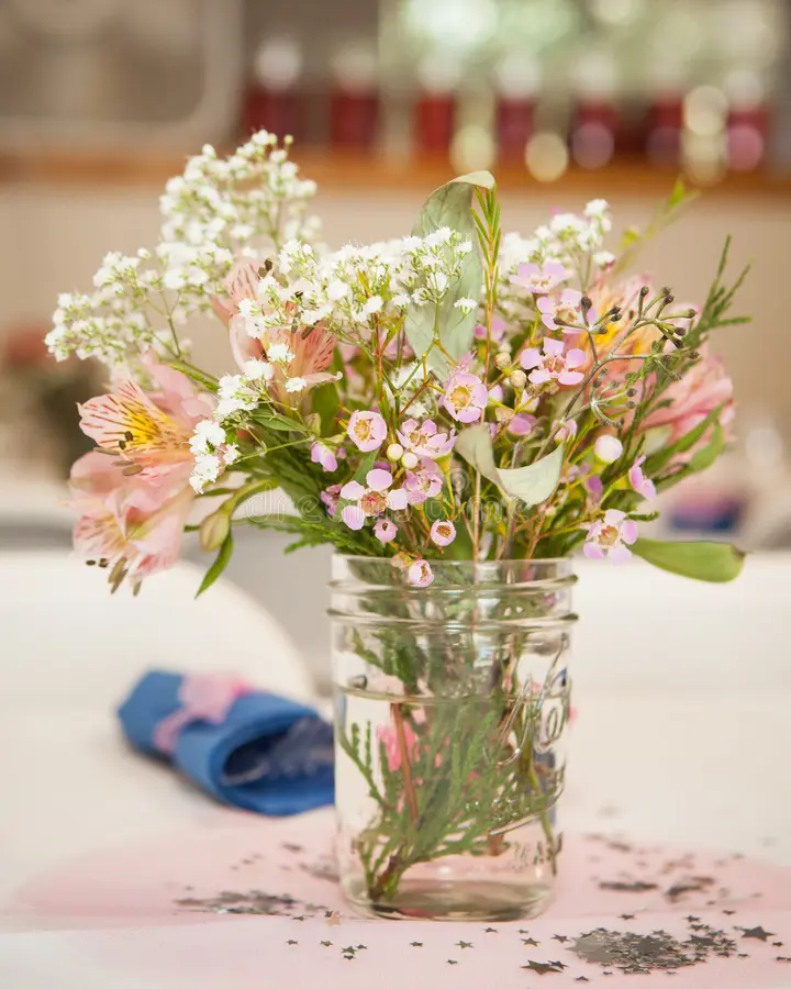 Rustic wildflowers in a mason jar.