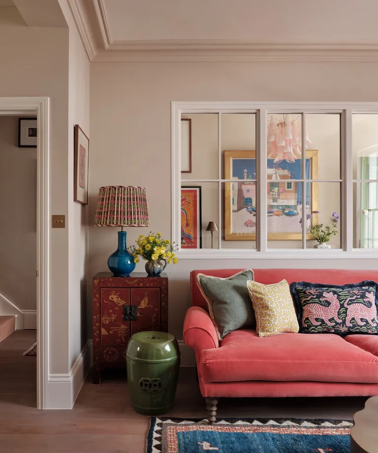 decorate a living room on a budget example of using fabric and textures.