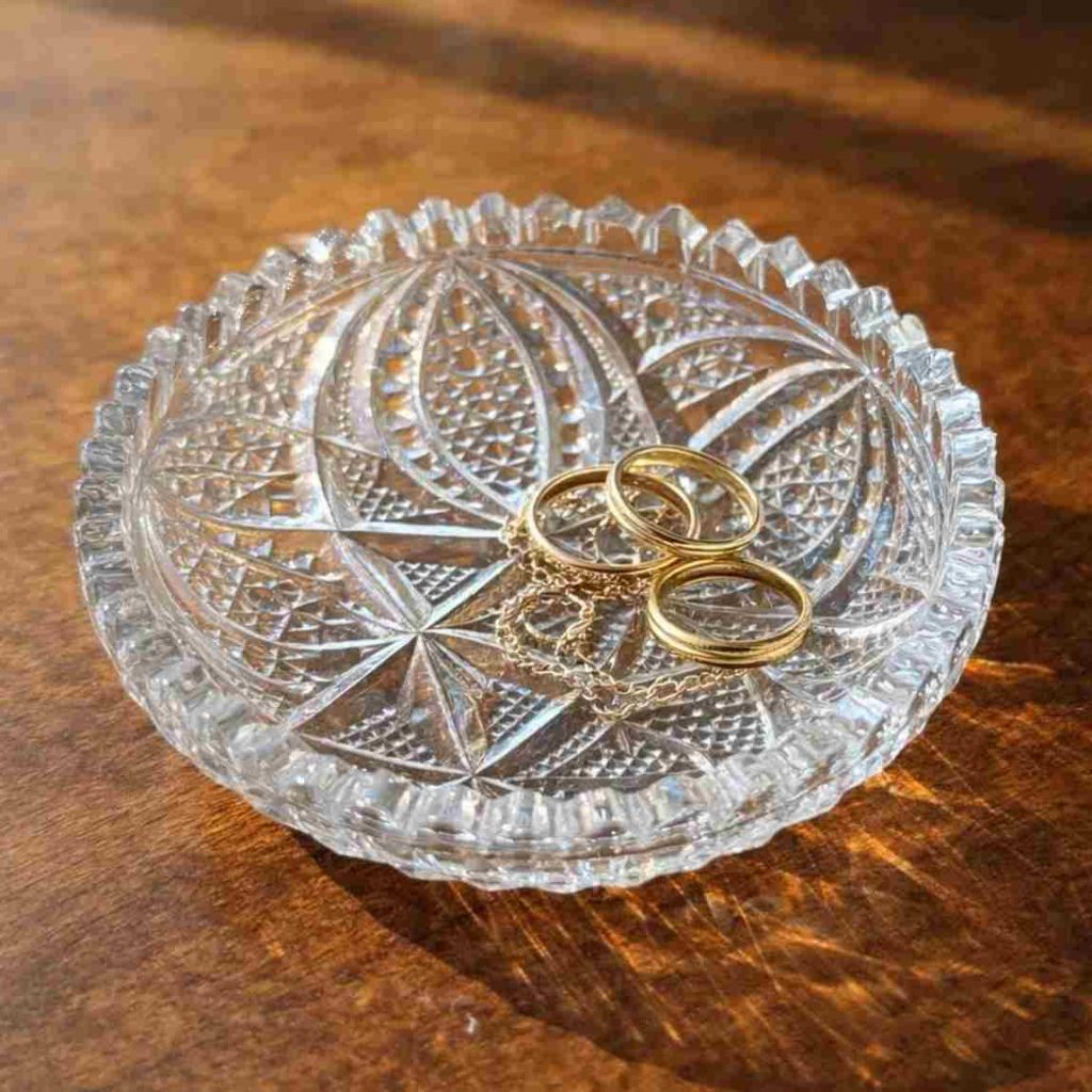 Vintage crystal glass bowl repurposed as cheap laundry room decor for jewelry and change from pockets